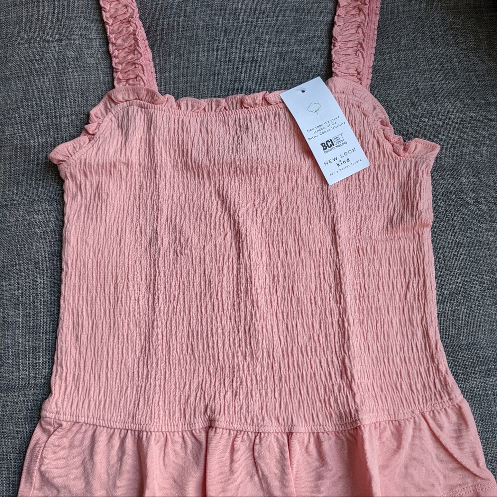 Pink peplum top